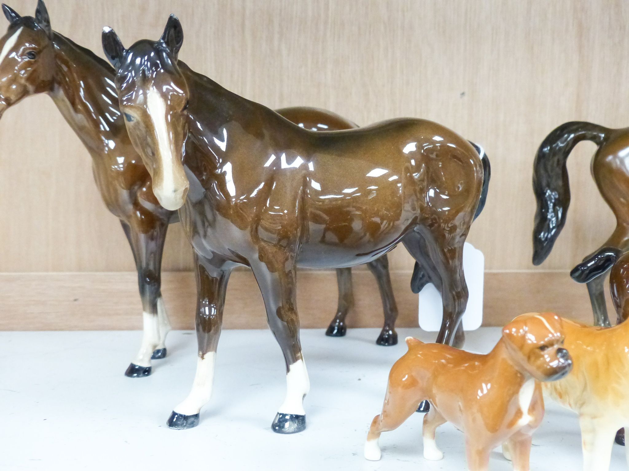 Five Beswick horses and two Beswick dogs, tallest 21.5 cm